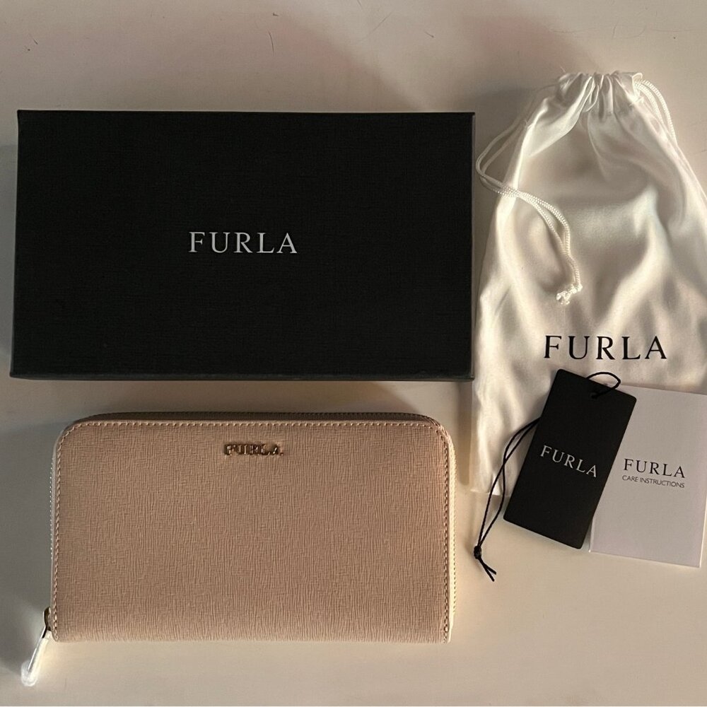 Furla extra large zip around leather wallet. Brand new with tags in box